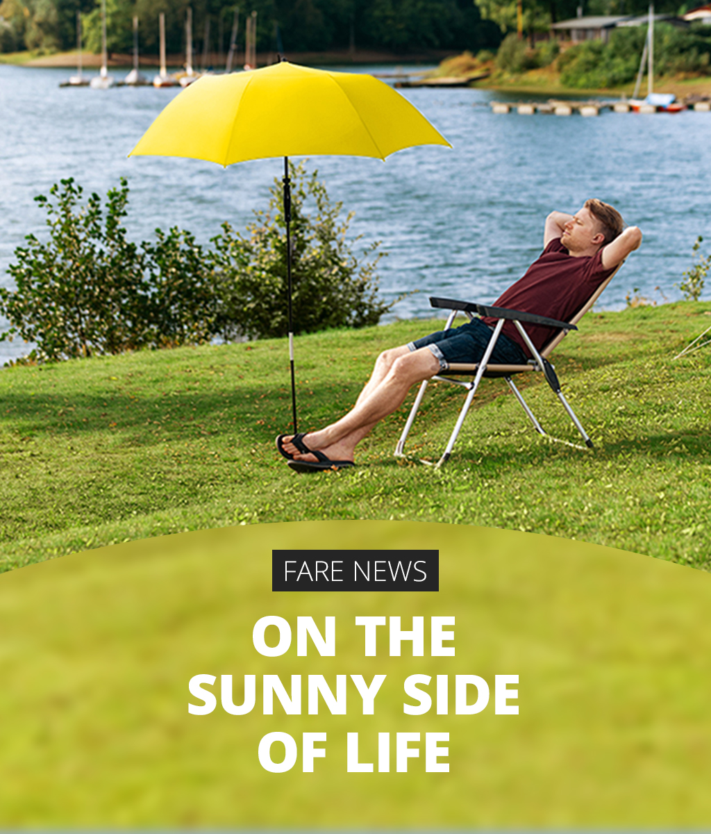 Man with parasol blue sky